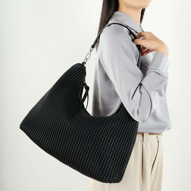 Le sac à bandoulière « DEMI »