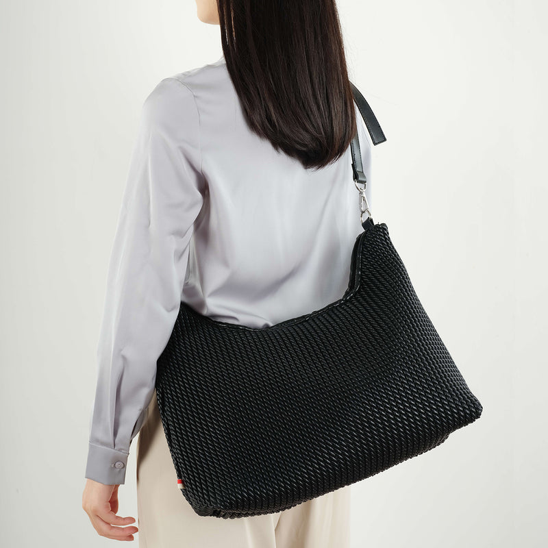 Le sac à bandoulière « DEMI »
